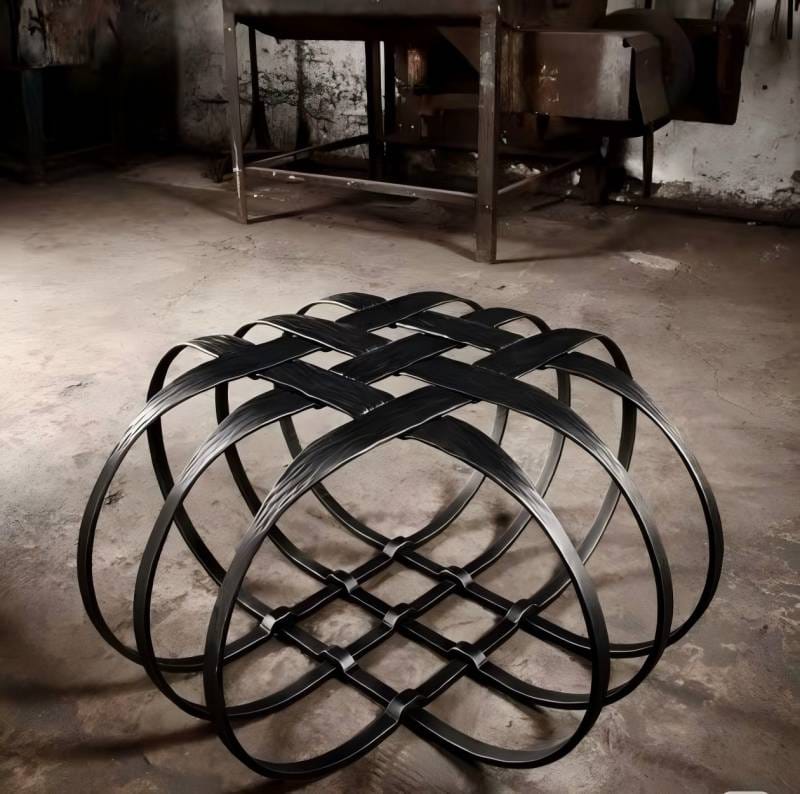 Black metal frame with a woven design, industrial style