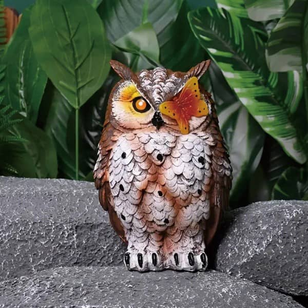 Resin owl statue solar light with butterfly accent and glowing eye (freestanding)