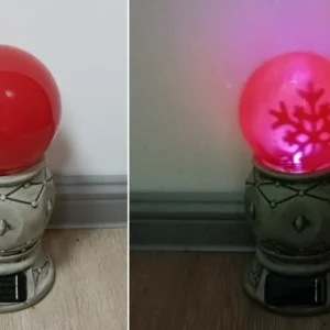 SM23405 Rotating Solar Stake Light Resin Statue with Snowflake Globe