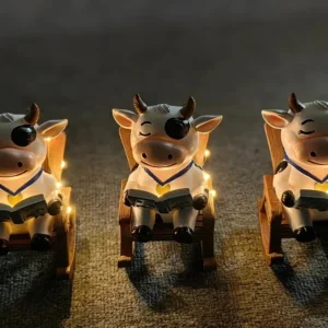SM24591 Solar Resin Statue - Cow Sitting on Chair Freestanding Animal Light