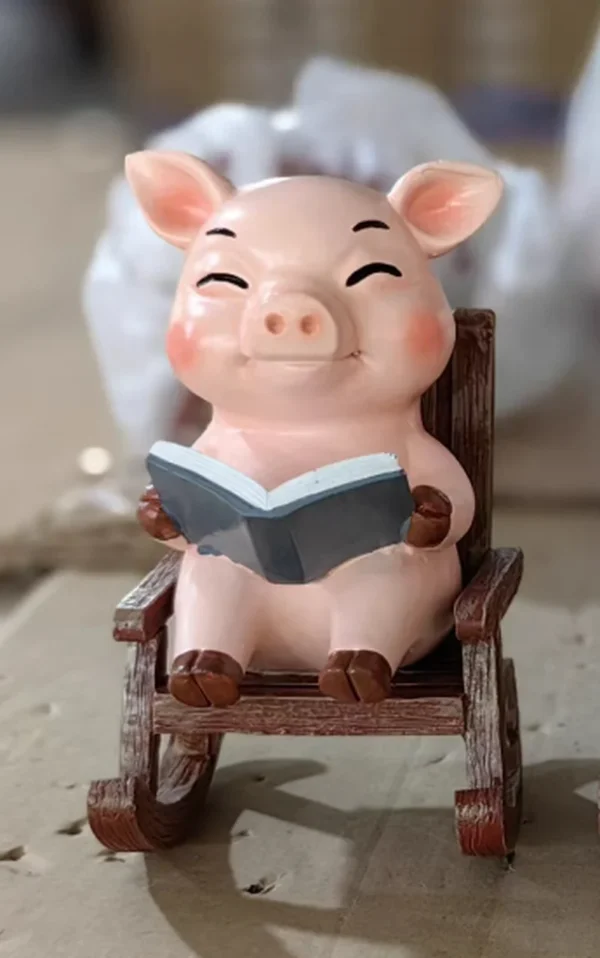 SM24592 Solar Resin Statue - Pig Sitting on Chair Freestanding Animal Light